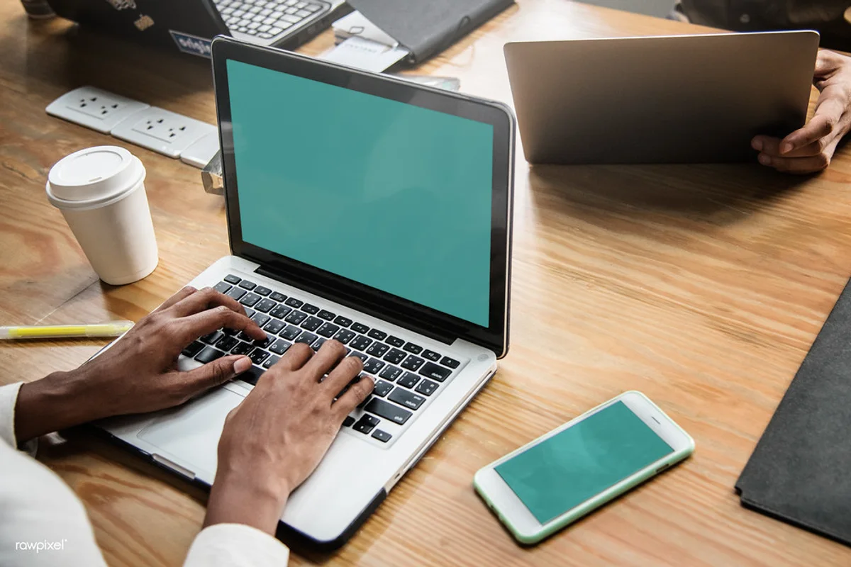 Quality manager organising digital accreditation evidence for How do I keep accreditation documents version-controlled?