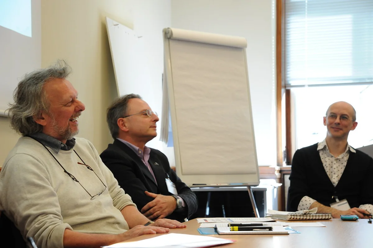 Quality manager organising digital accreditation evidence for What accreditation reports should a training provider review each month?