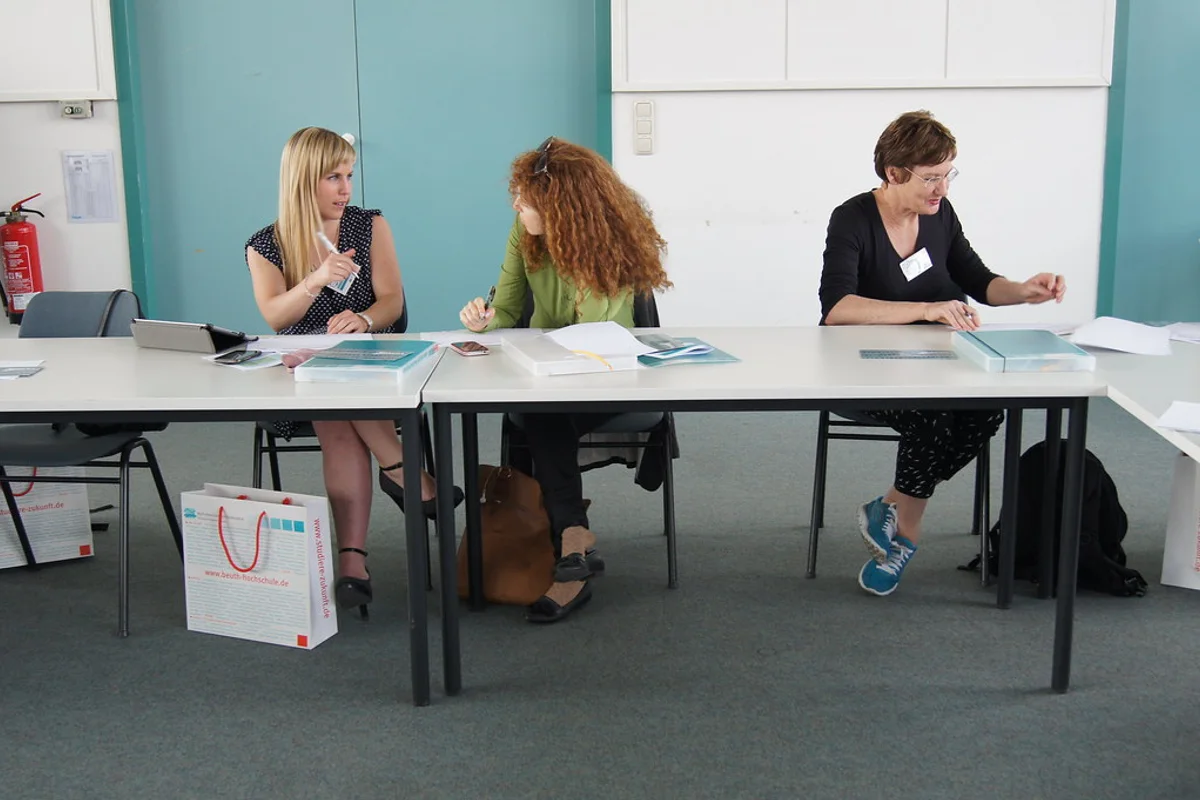Training provider staff reviewing learner evidence for What should an assessment policy include for accreditation?